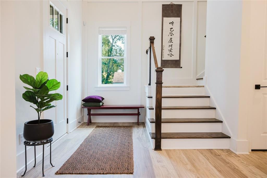 330 Mount Zion Road Southwest Hapeville, GA 30354 - Photo 8 of 41 a bedroom with furniture and a potted plant