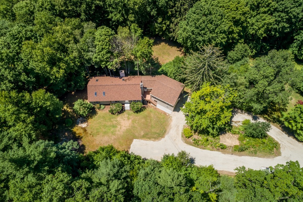 88 Fiskdale Road Brookfield, MA 01506 - Photo 1 of 30 an aerial view of a house with yard and outdoor seating