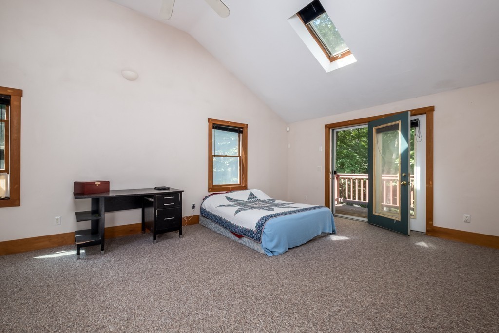 88 Fiskdale Road Brookfield, MA 01506 - Photo 14 of 30 a bedroom with a bed and a window