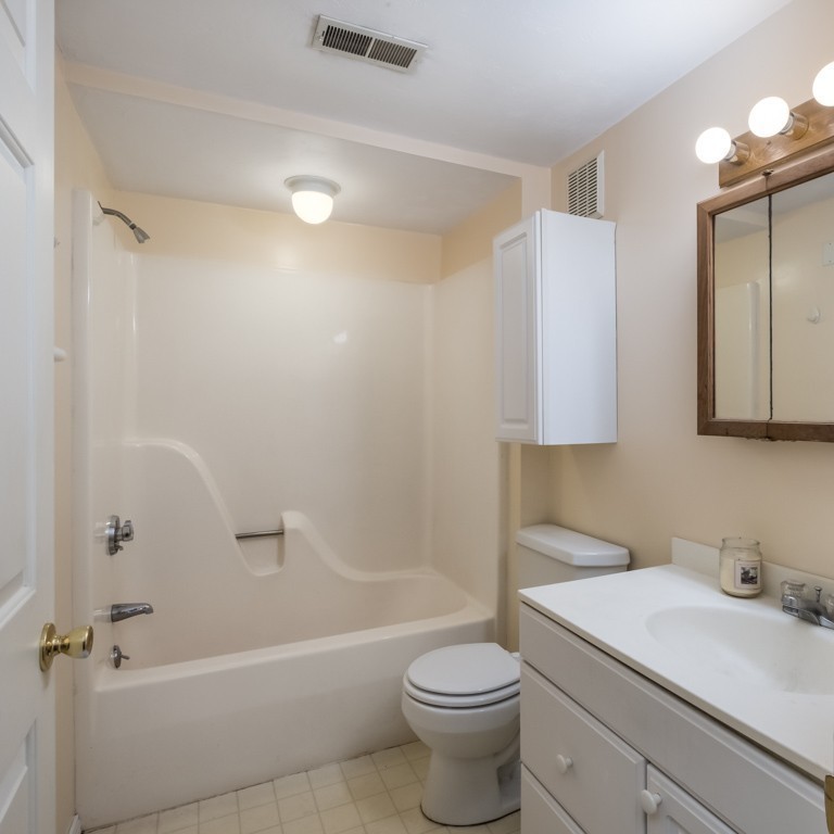 88 Fiskdale Road Brookfield, MA 01506 - Photo 21 of 30 a bathroom with a sink a toilet and shower
