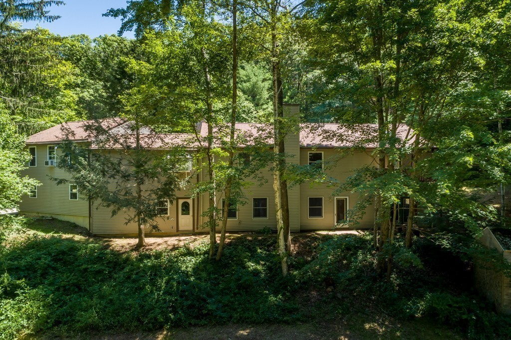 88 Fiskdale Road Brookfield, MA 01506 - Photo 25 of 30 a view of a house with a tree
