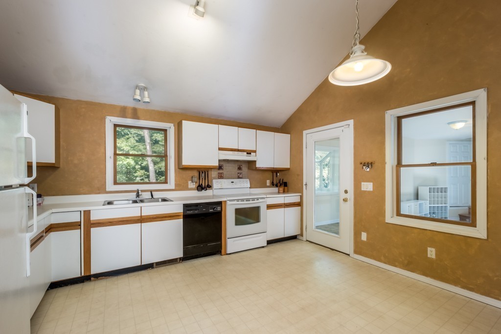 88 Fiskdale Road Brookfield, MA 01506 - Photo 5 of 30 a large kitchen with stainless steel appliances granite countertop a sink and cabinets with wooden floor