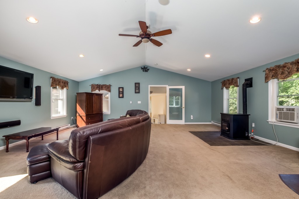 88 Fiskdale Road Brookfield, MA 01506 - Photo 7 of 30 a living room with furniture and a flat screen tv