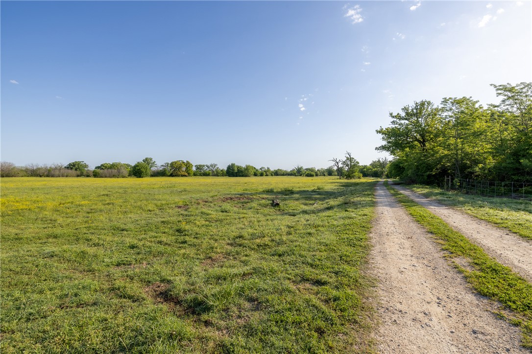 0 Clear Lake Road Bryan, TX 77808 - Photo 13 of 34 View of dirt / gravel road with a rural view