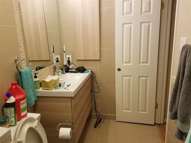 a bathroom with a sink and a toilet