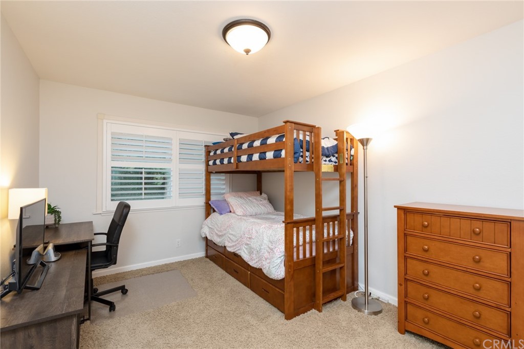 484 Traverse Drive Costa Mesa, CA 92626 - Photo 12 of 17 a bedroom with a bunk bed and a desk in it
