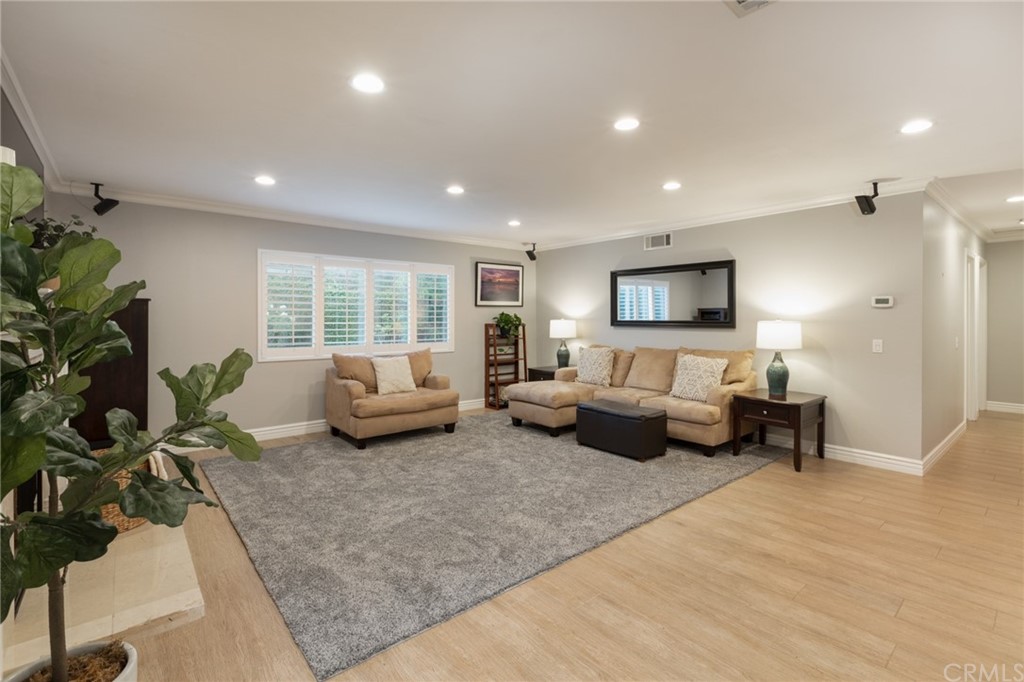 484 Traverse Drive Costa Mesa, CA 92626 - Photo 6 of 17 a bedroom with furniture and a couch