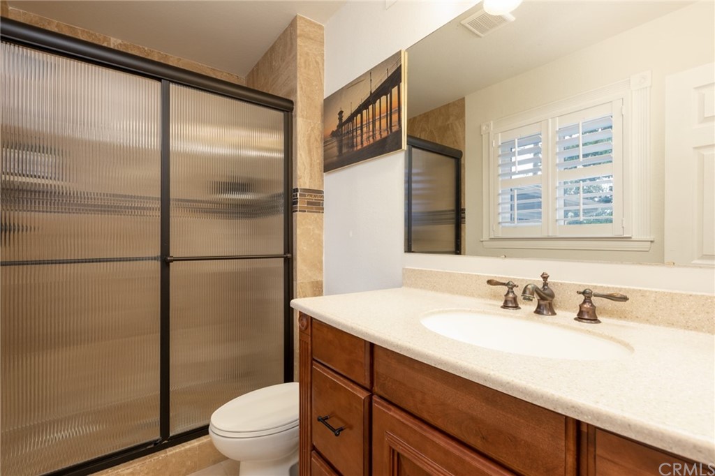 484 Traverse Drive Costa Mesa, CA 92626 - Photo 10 of 17 a bathroom with a sink toilet and shower