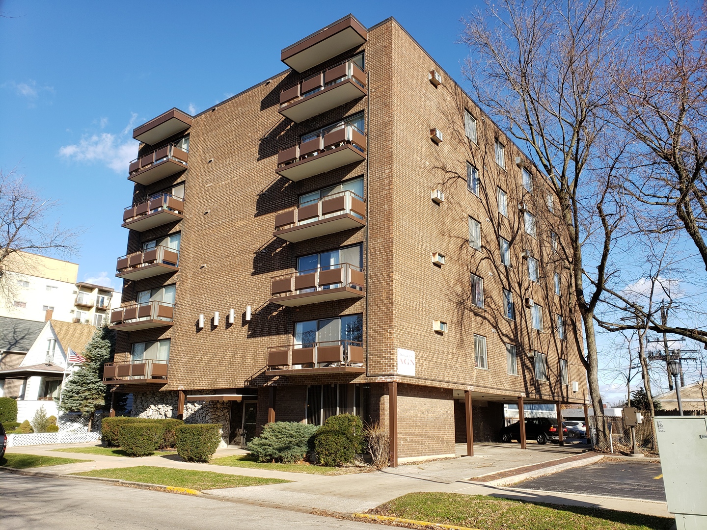 336 Lathrop Avenue, Unit 306 Forest Park, IL 60130 - Photo 1 of 42 a front view of a building with a street