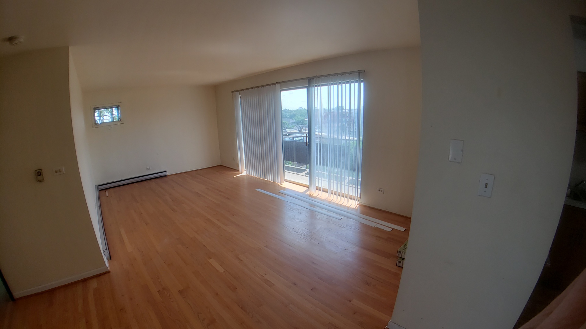 336 Lathrop Avenue, Unit 306 Forest Park, IL 60130 - Photo 15 of 42 an empty room with wooden floor and windows