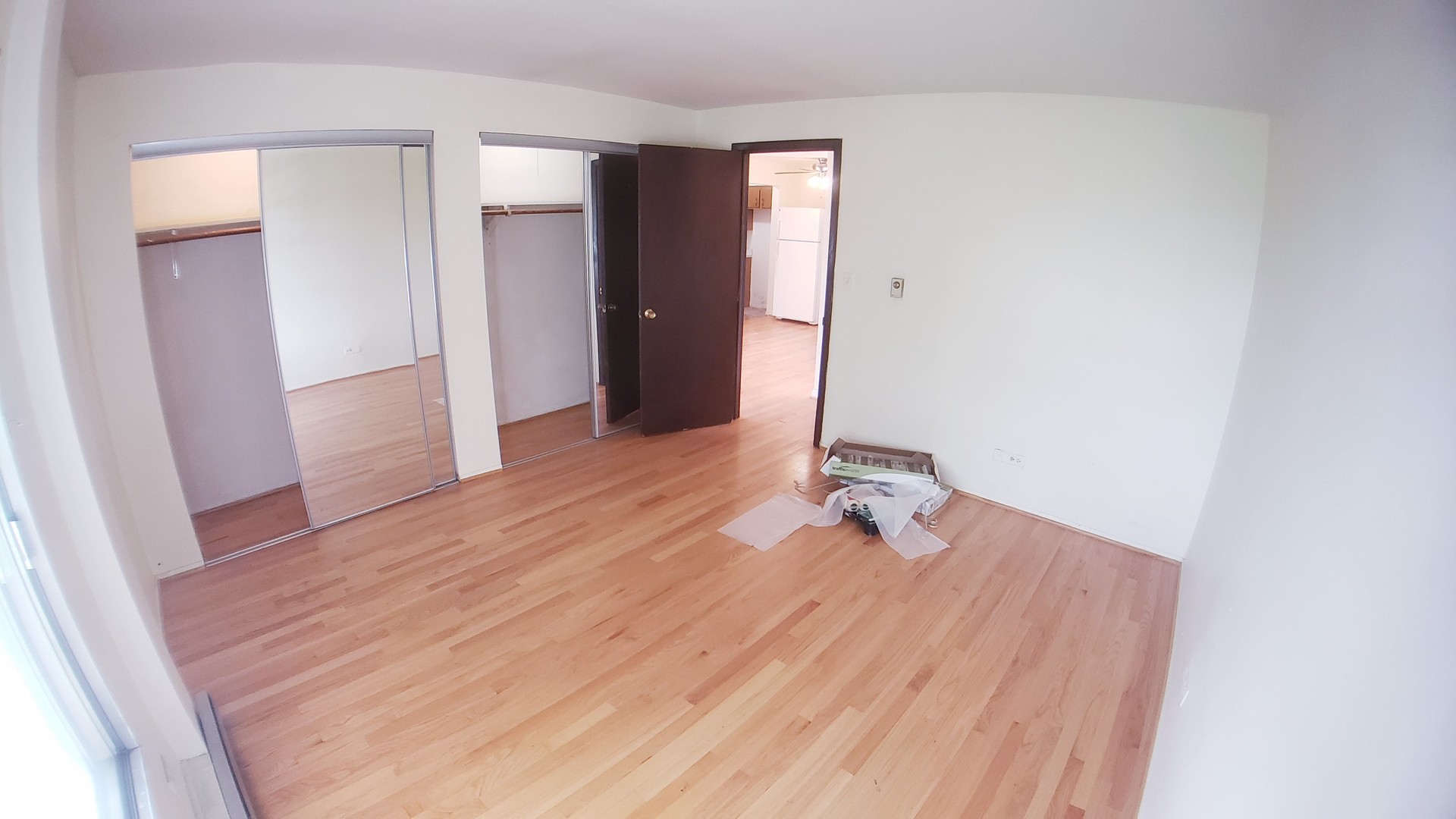 336 Lathrop Avenue, Unit 306 Forest Park, IL 60130 - Photo 25 of 42 an empty room with wooden floor and closet