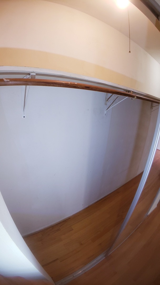 336 Lathrop Avenue, Unit 306 Forest Park, IL 60130 - Photo 26 of 42 a view of a room with wooden floor