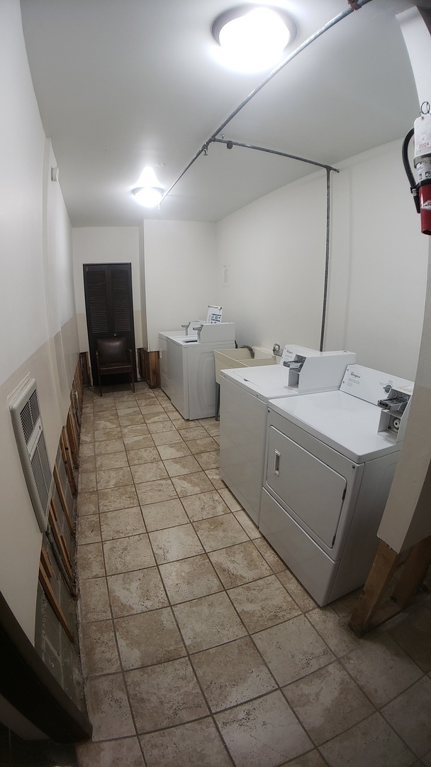 336 Lathrop Avenue, Unit 306 Forest Park, IL 60130 - Photo 30 of 42 a utility room with dryer and washer