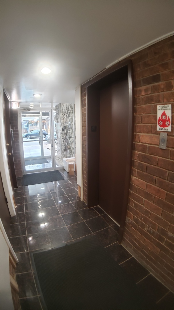 336 Lathrop Avenue, Unit 306 Forest Park, IL 60130 - Photo 5 of 42 a view of a hallway