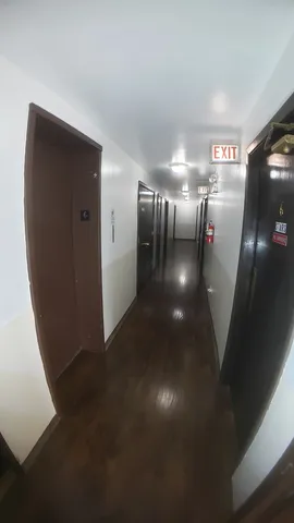 a view of gallery with hallway