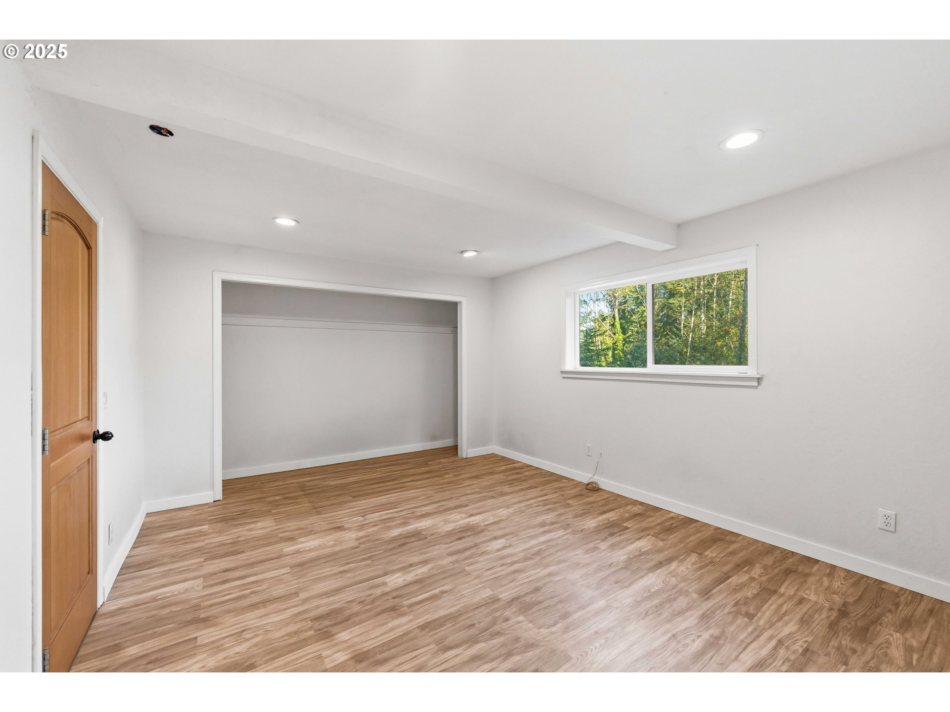 62356 Olive Barber Road Coos Bay, OR 97420 - Photo 21 of 34 a view of an empty room with wooden floor