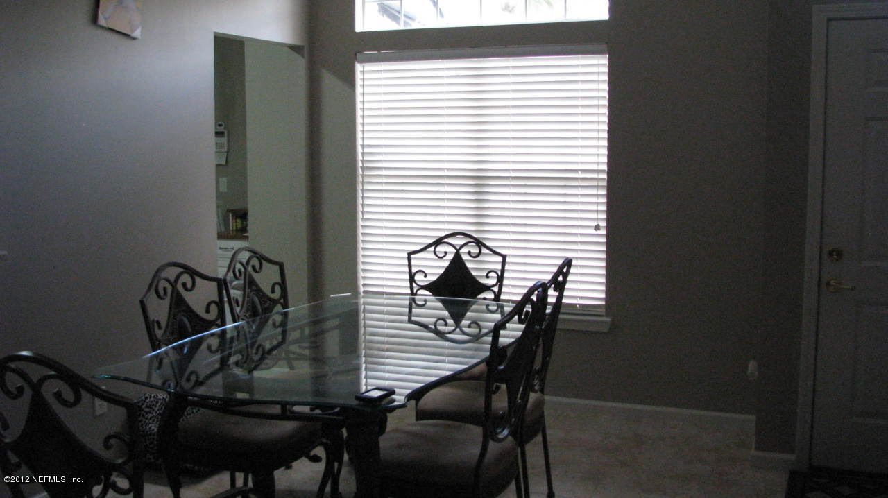 4152 East Ripken Jacksonville, FL 32224 - Photo 4 of 14 a view of a room with gym equipment
