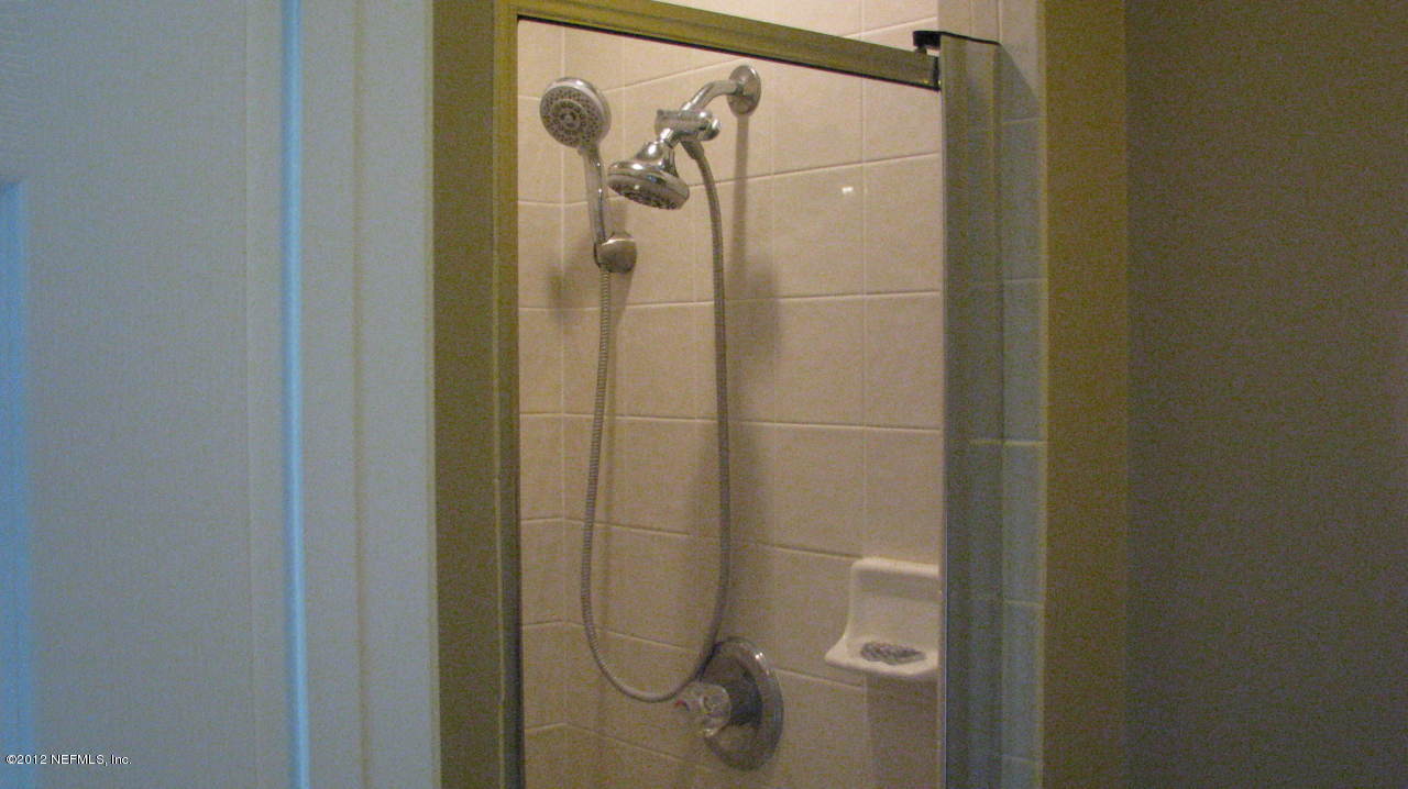 4152 East Ripken Jacksonville, FL 32224 - Photo 7 of 14 a bathroom with a shower