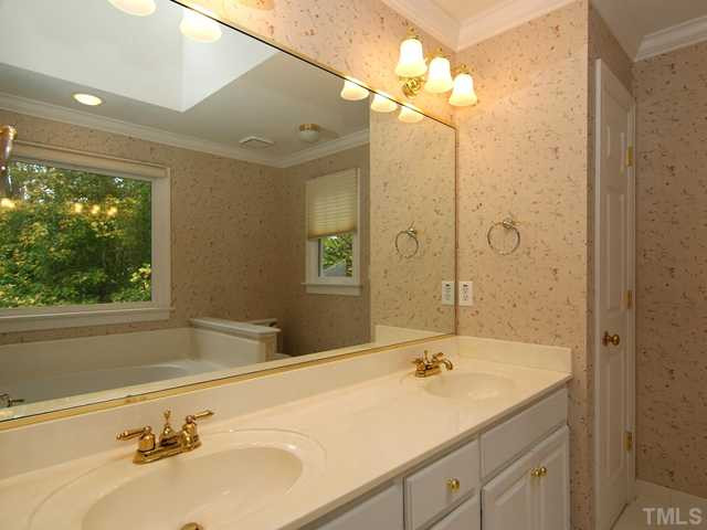 4829 Salem Ridge Road Holly Springs, NC 27540 - Photo 19 of 25 The skylight in the master bath provides plenty of natural light. Master Bath/Spa