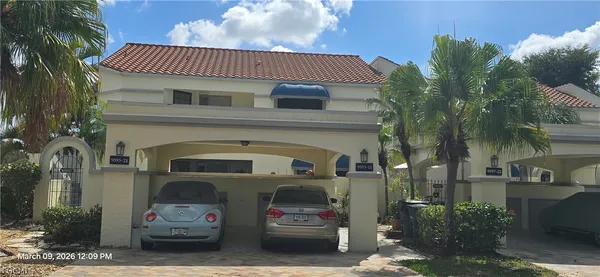 a front view of a house with a garage