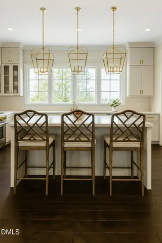 a view of a house with potted plants