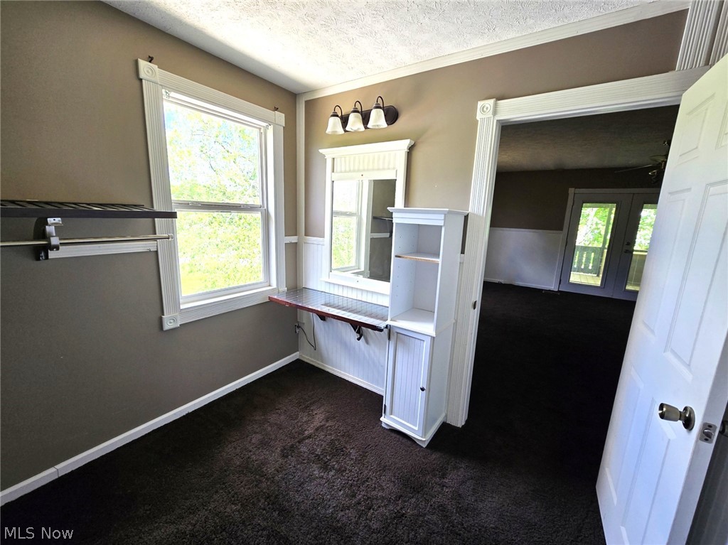 28365 Osborne Road Coolville, OH 45723 - Photo 24 of 47 Primary closet with makeup vanity