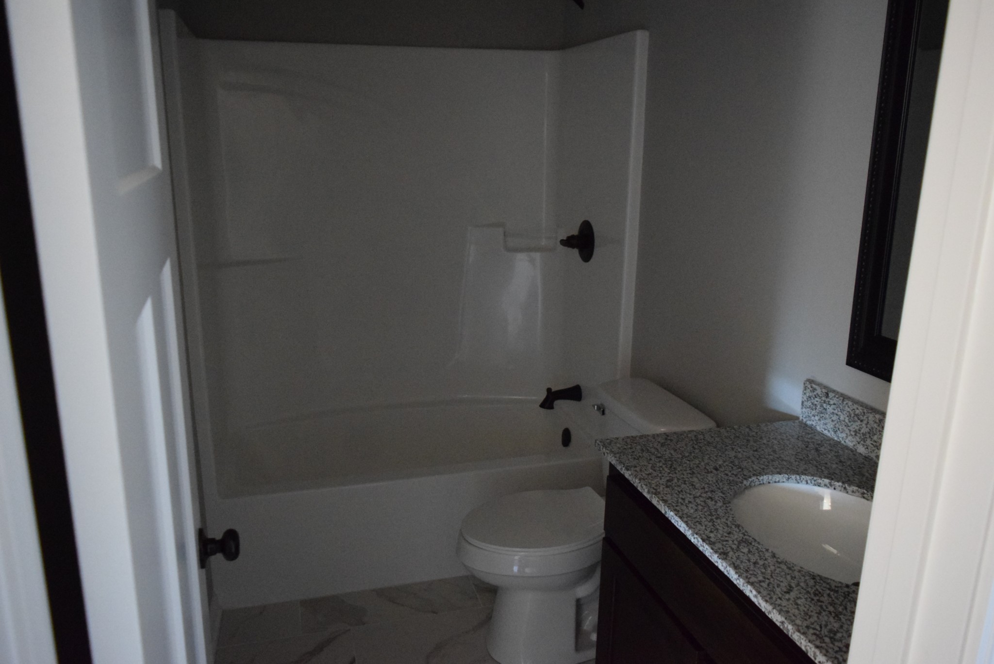 21 Ballard Road Manchester, TN 37355 - Photo 6 of 9 a bathroom with a granite countertop sink toilet and shower