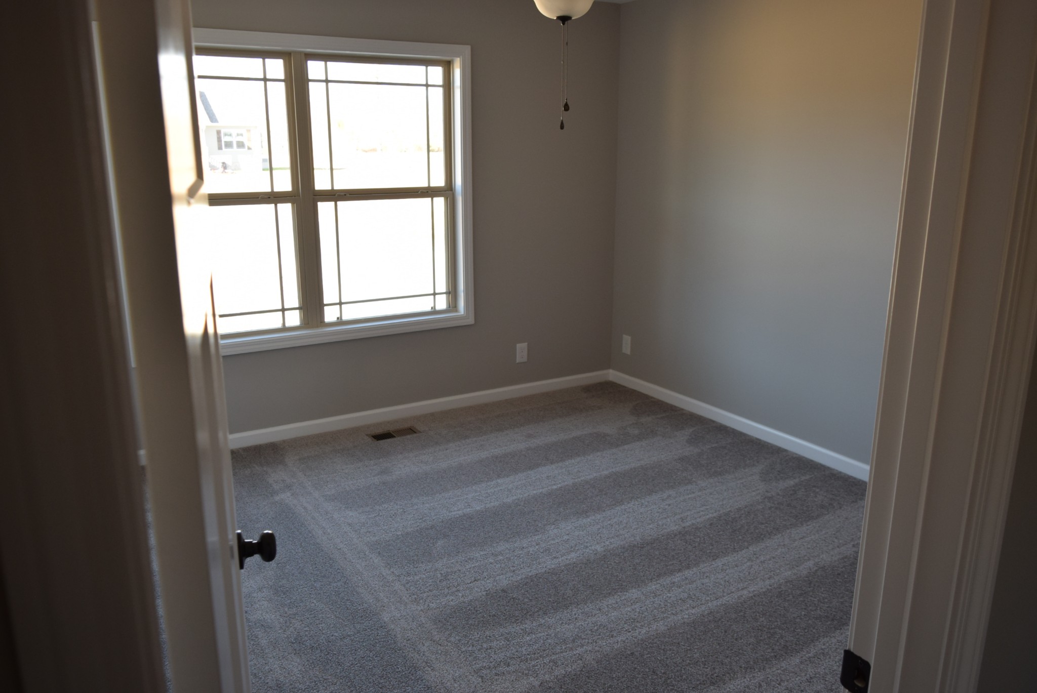 21 Ballard Road Manchester, TN 37355 - Photo 7 of 9 an empty room with a window
