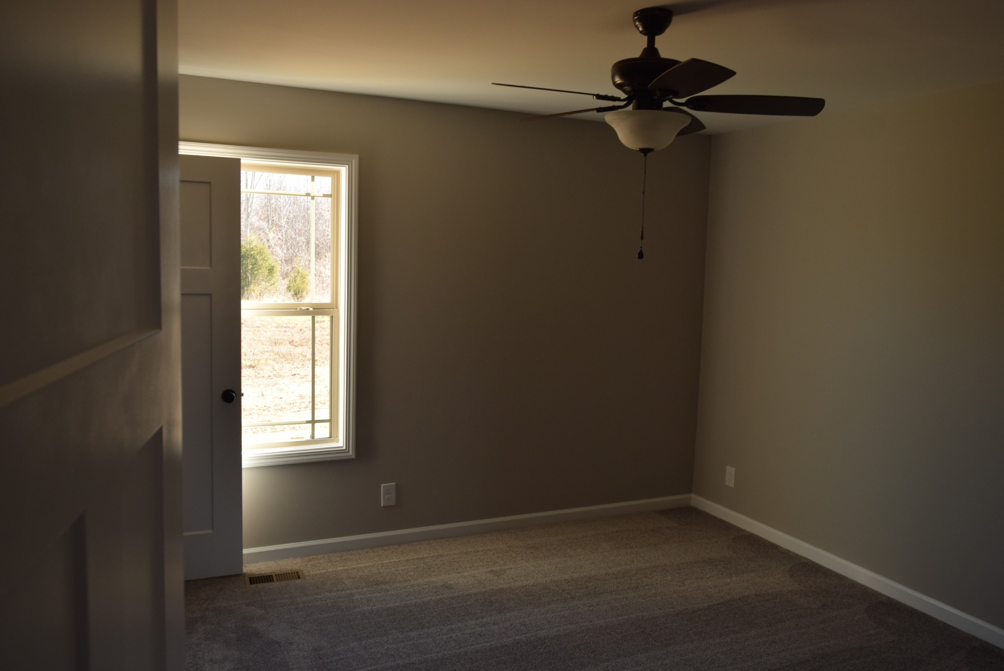 21 Ballard Road Manchester, TN 37355 - Photo 8 of 9 an empty room with a window