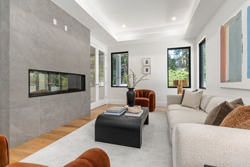 29 Levbert Road Newton, MA 02459 - Photo 14 of 40 a living room with furniture and a large window