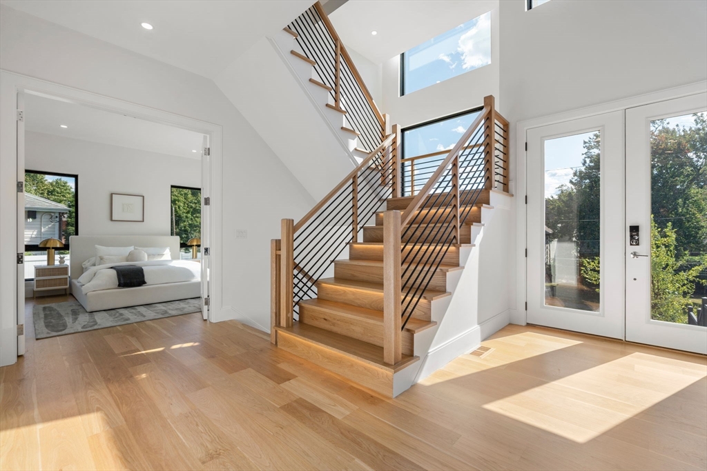 29 Levbert Road Newton, MA 02459 - Photo 2 of 40 a view of entryway and hall with wooden floor
