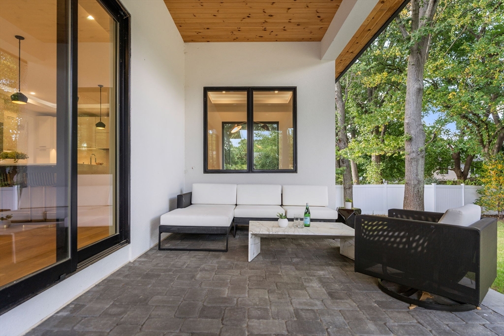 29 Levbert Road Newton, MA 02459 - Photo 30 of 40 a balcony with furniture and window