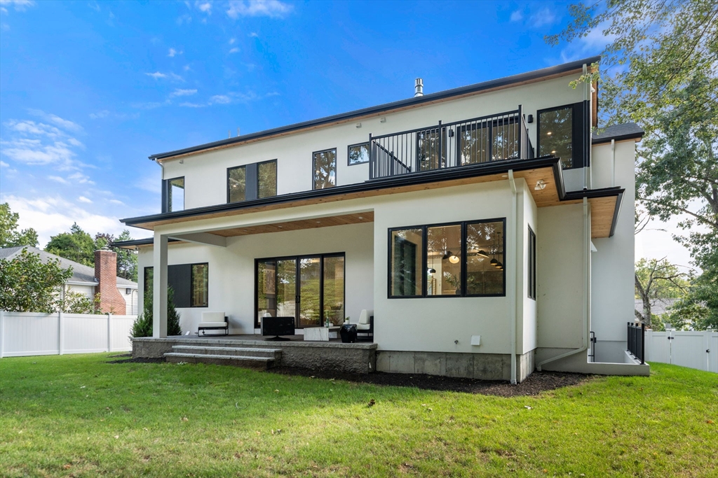 29 Levbert Road Newton, MA 02459 - Photo 32 of 40 a front view of a house with a garden