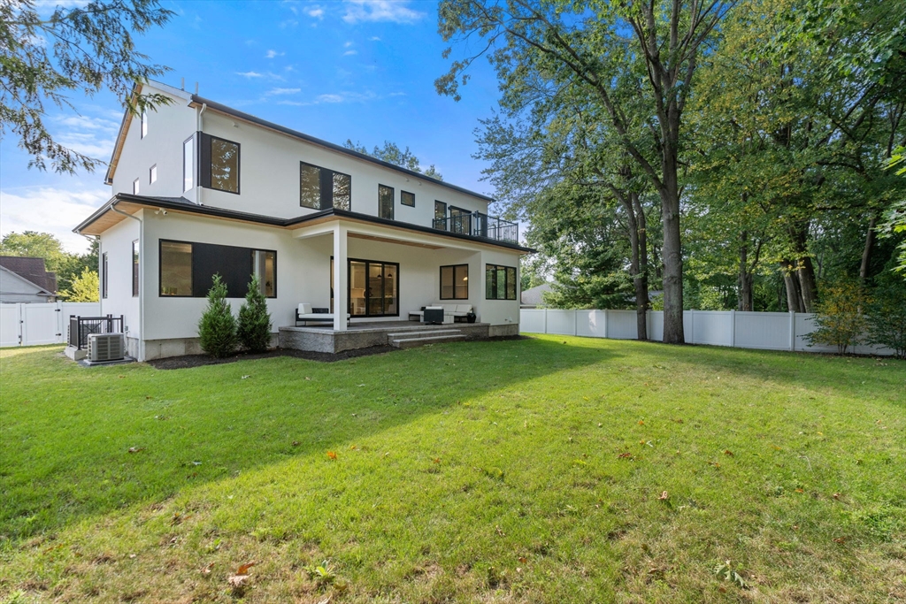 29 Levbert Road Newton, MA 02459 - Photo 33 of 40 front view of a house with a big yard