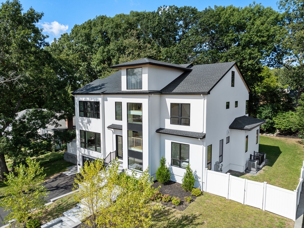 29 Levbert Road Newton, MA 02459 - Photo 36 of 40 a front view of a house with a yard