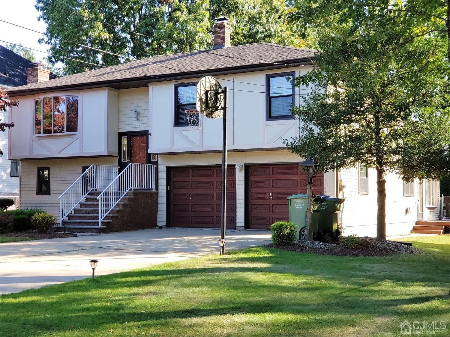 24 Hillsdale Road Edison, NJ 08820 - Photo 2 of 41 a view of a house with a yard