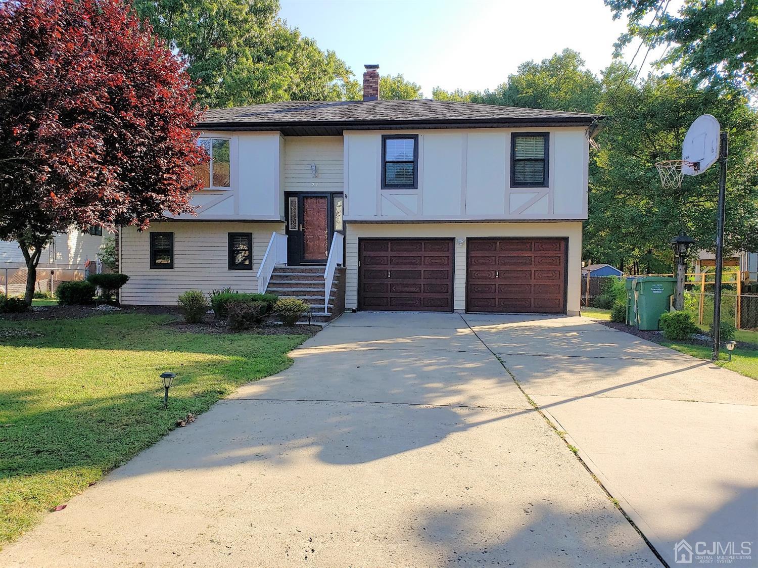 24 Hillsdale Road Edison, NJ 08820 - Photo 3 of 41 a front view of house with yard