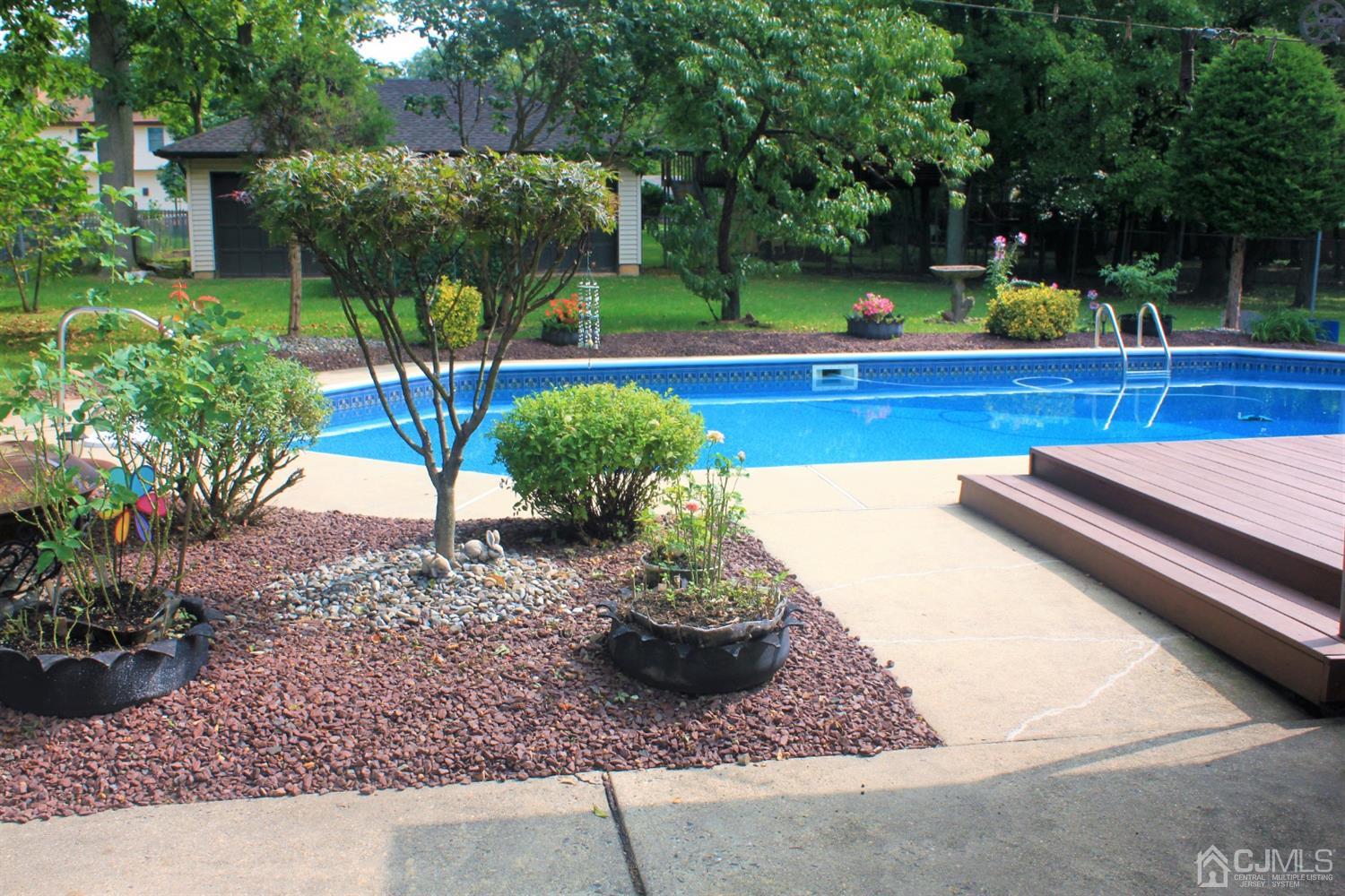 24 Hillsdale Road Edison, NJ 08820 - Photo 26 of 41 a view of a yard with a slide