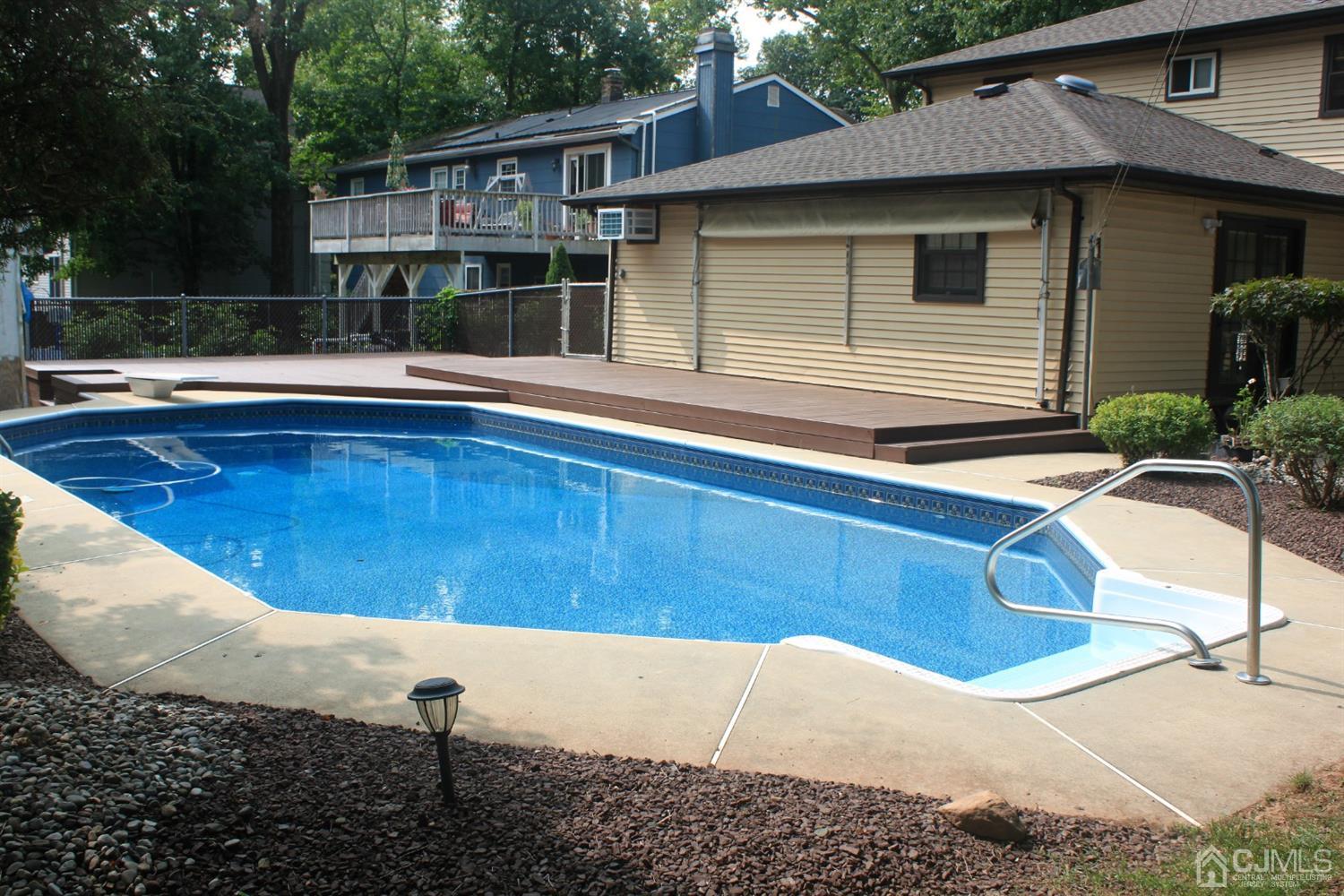 24 Hillsdale Road Edison, NJ 08820 - Photo 27 of 41 a view of a house with a swimming pool