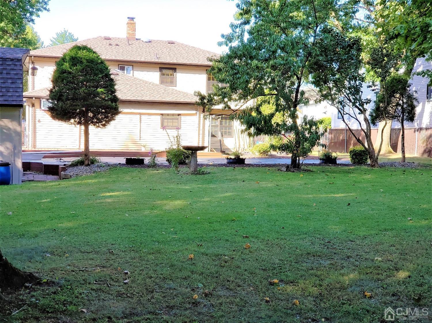24 Hillsdale Road Edison, NJ 08820 - Photo 30 of 41 a view of a house with a backyard