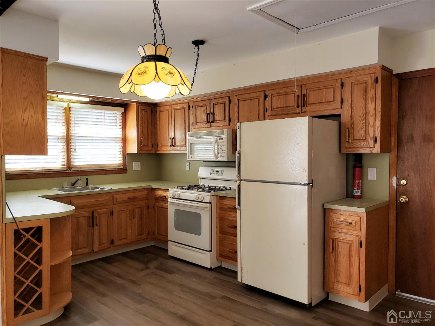 24 Hillsdale Road Edison, NJ 08820 - Photo 36 of 41 a kitchen with granite countertop a sink stainless steel appliances and window