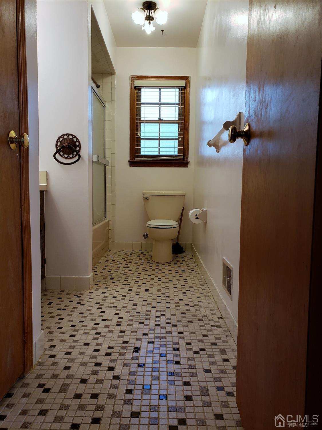 24 Hillsdale Road Edison, NJ 08820 - Photo 40 of 41 a bathroom with a toilet and a shower