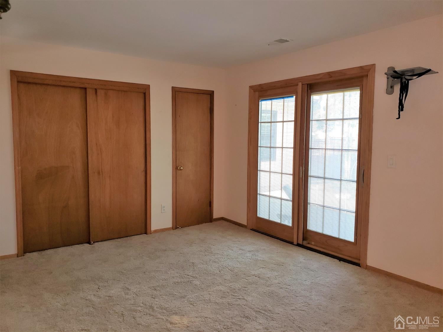 24 Hillsdale Road Edison, NJ 08820 - Photo 41 of 41 a view of an empty room with a window