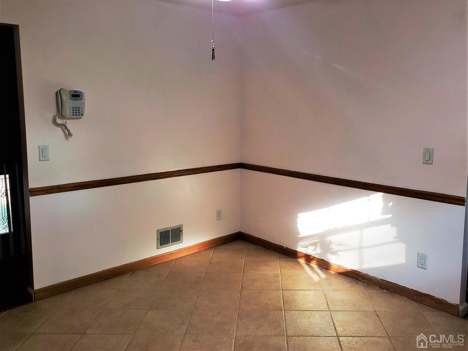 24 Hillsdale Road Edison, NJ 08820 - Photo 7 of 41 a view of a big room with an entryway