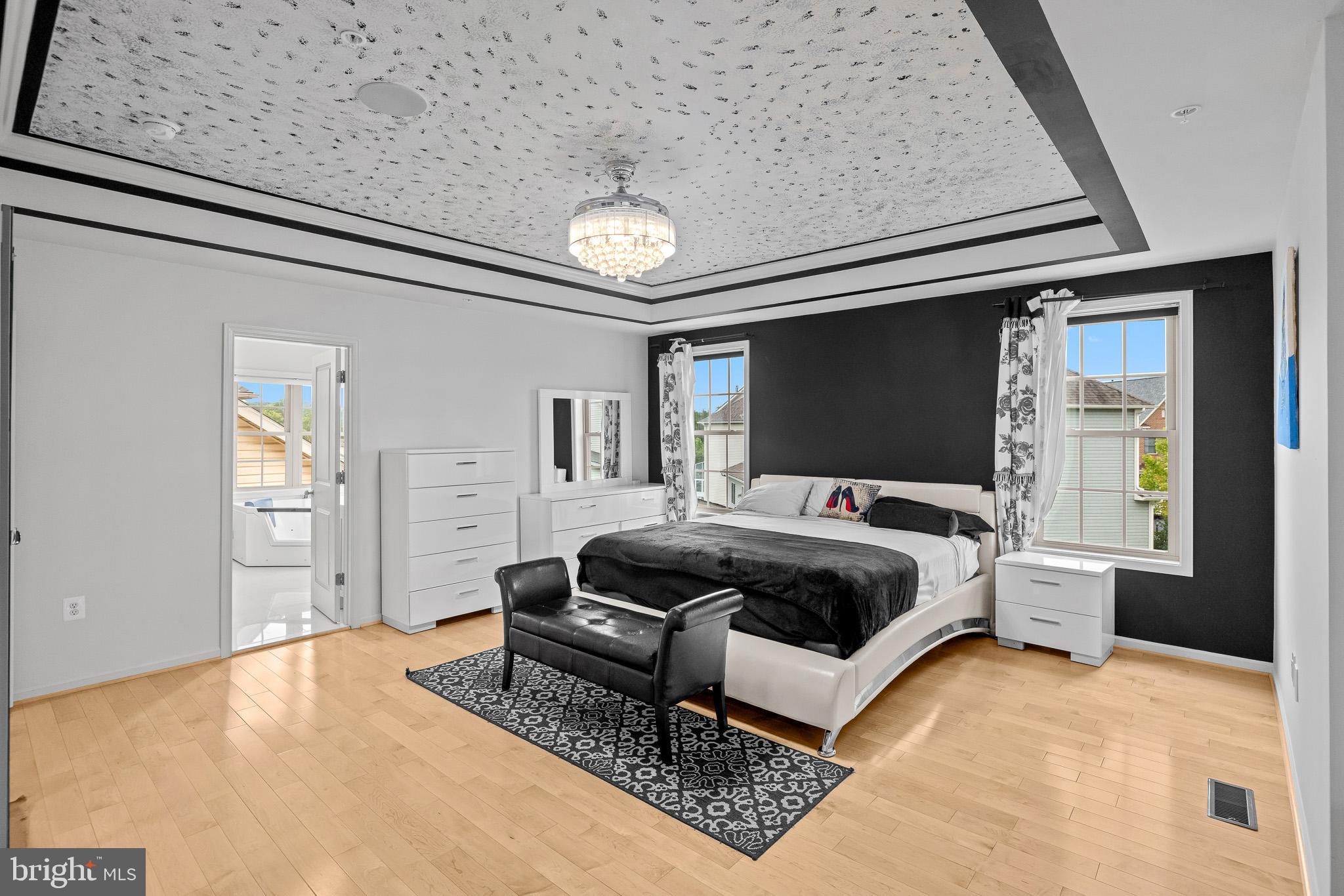 1116 Autumn Brook Avenue Silver Spring, MD 20906 - Photo 38 of 67 a spacious bedroom with a bed and window