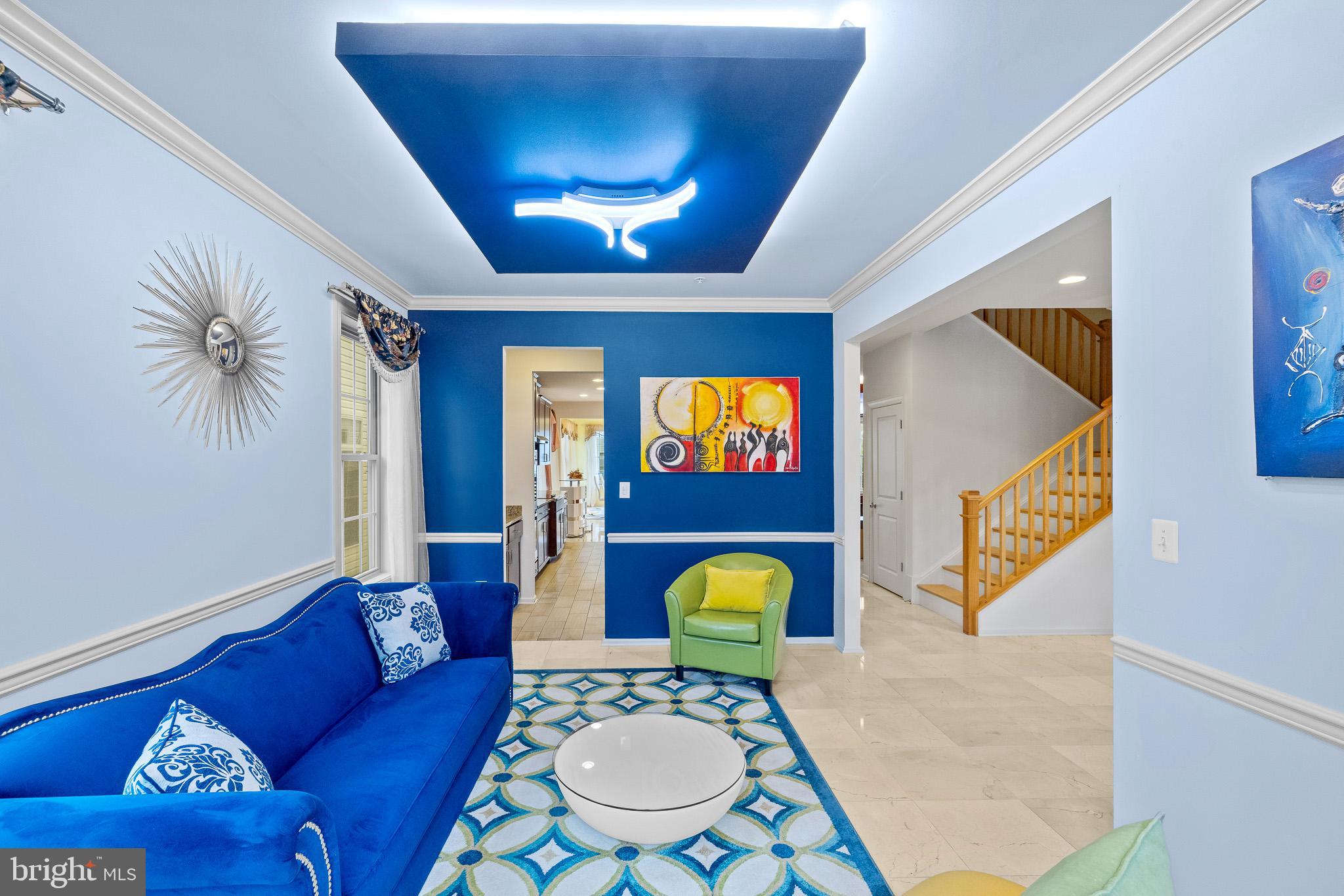 1116 Autumn Brook Avenue Silver Spring, MD 20906 - Photo 8 of 67 a living room with furniture and a wooden floor