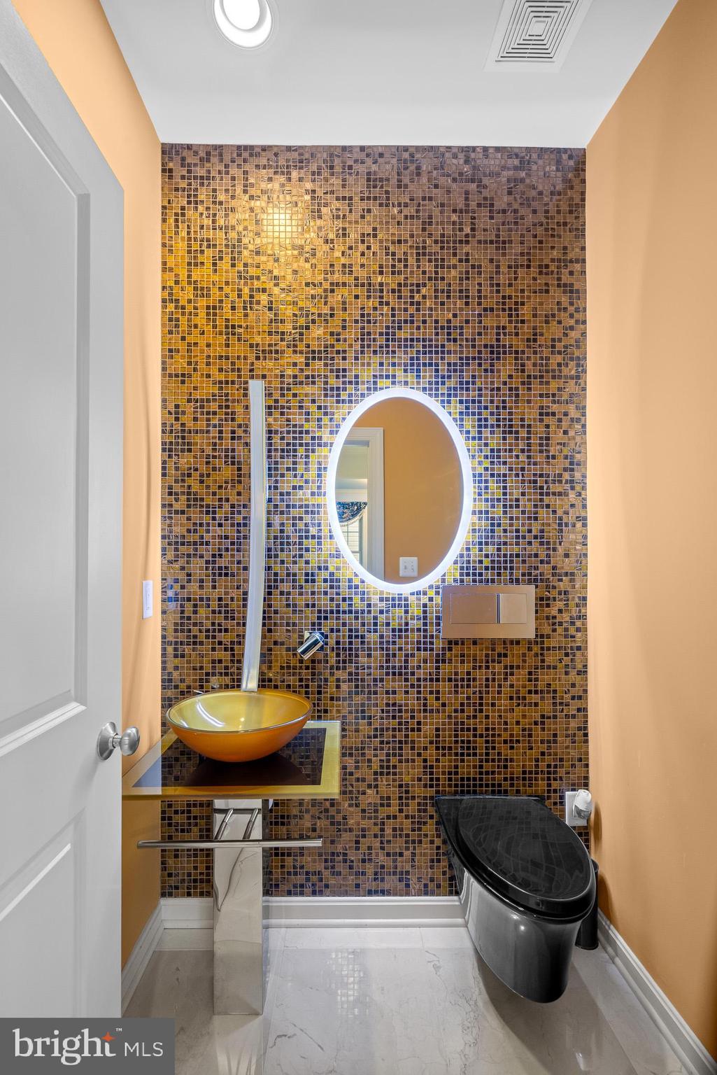 1116 Autumn Brook Avenue Silver Spring, MD 20906 - Photo 10 of 67 a bathroom with a toilet and a sink