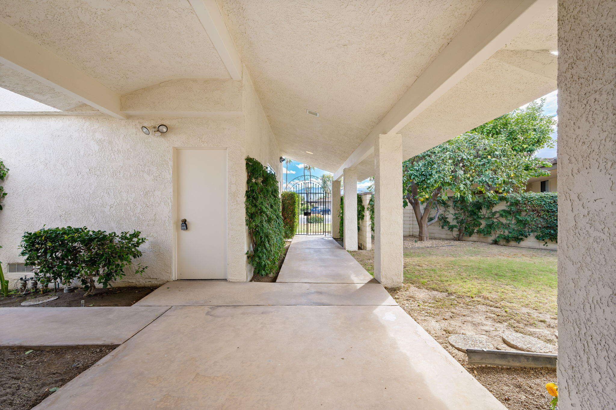 7 Tulane Court Rancho Mirage, CA 92270 - Photo 14 of 66 a front view of a house with garden