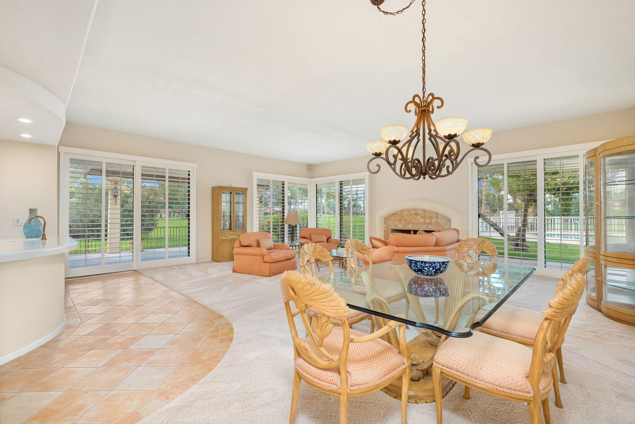 7 Tulane Court Rancho Mirage, CA 92270 - Photo 16 of 66 a very nice looking dining room with a large window and chandelier