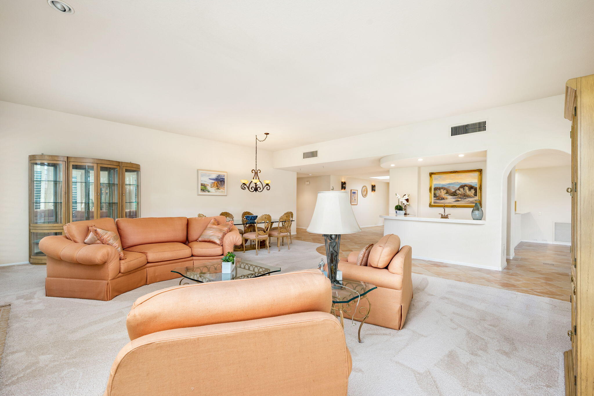 7 Tulane Court Rancho Mirage, CA 92270 - Photo 18 of 66 a living room with furniture and a large window